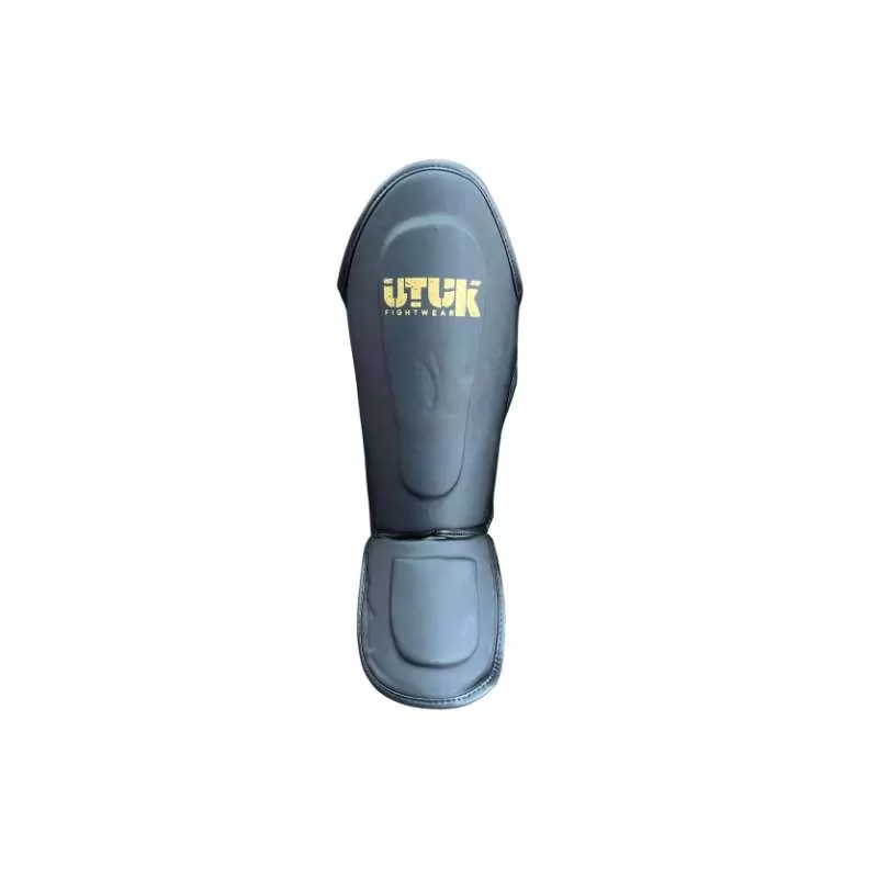 Utuk children's muay thai shin pads (black/gold)